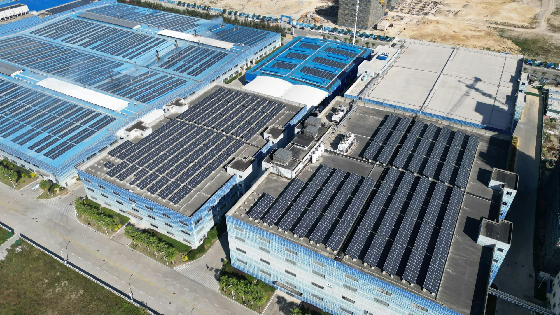 Solar panels installed across a flat roof deck.